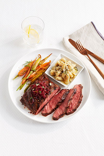 tfm_fs_b_stk_fltrn_rdonion_plt_EDITED plated flat iron steak with sides
